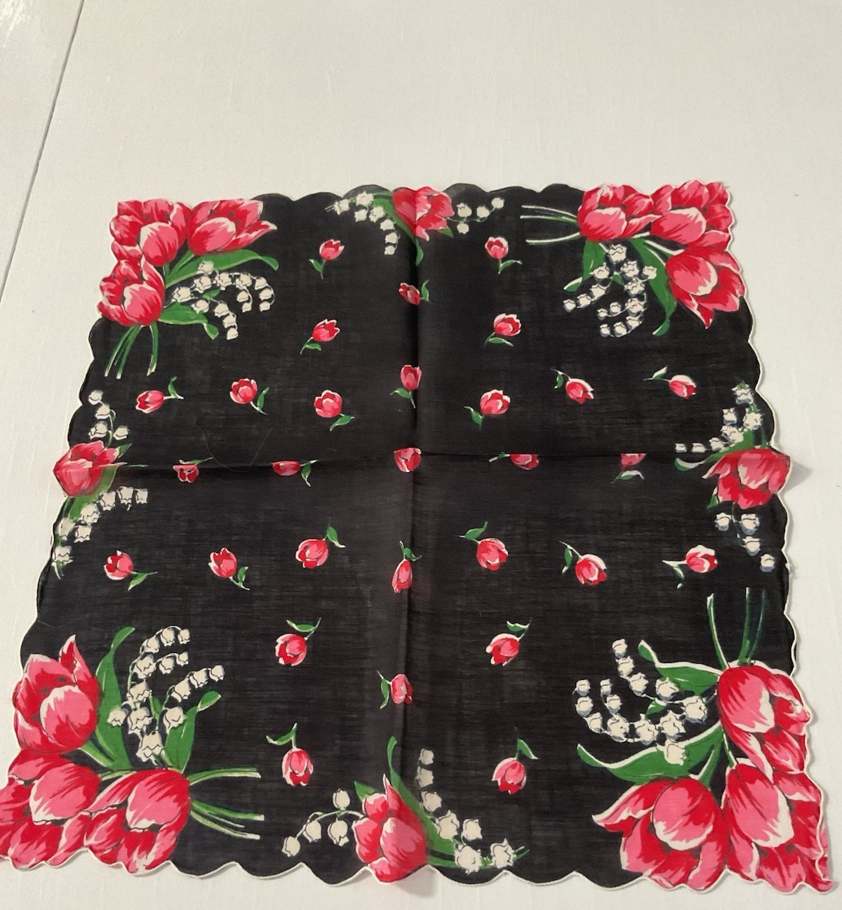VINTAGE HANKIE BLACK WITH SCALLOPED BORDER TULIPS & LILY OF THE VALLEY 12″