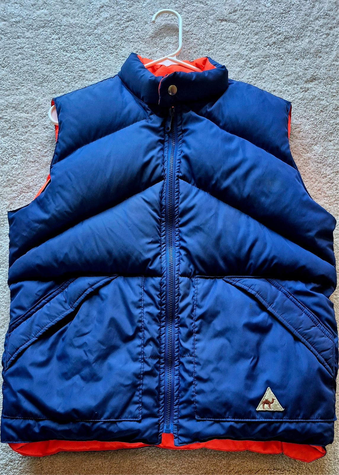 Vintage 1970s-1980s reversible blue and orange puffer vest from the Camel brand