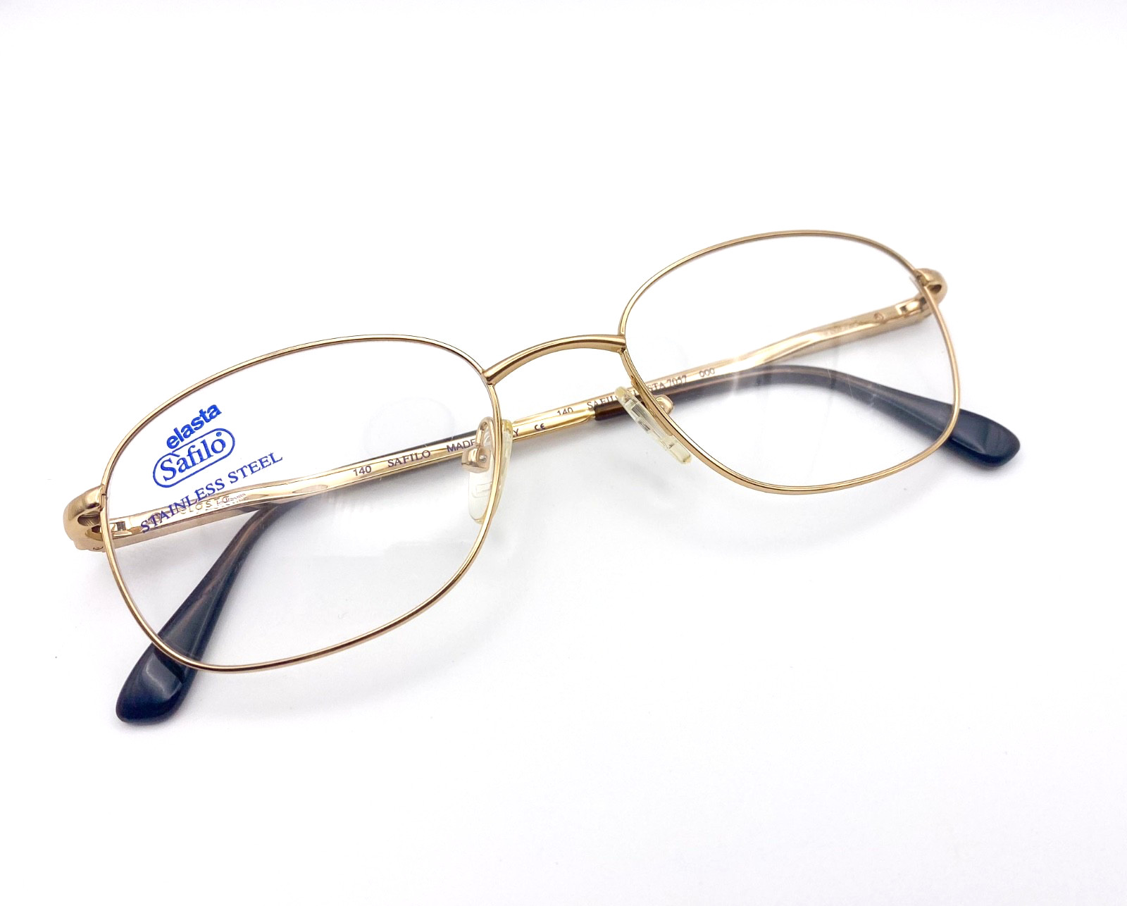NOS 1990s Safilo Elasta Vintage Gold Stainless Steel Eyeglasses Oval Frames