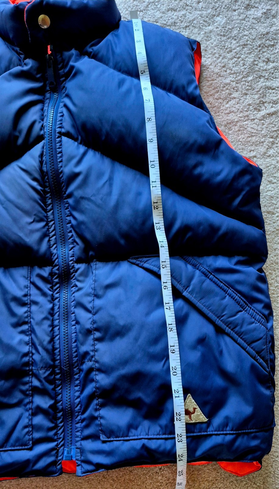 Vintage 1970s-1980s reversible blue and orange puffer vest from the Camel brand