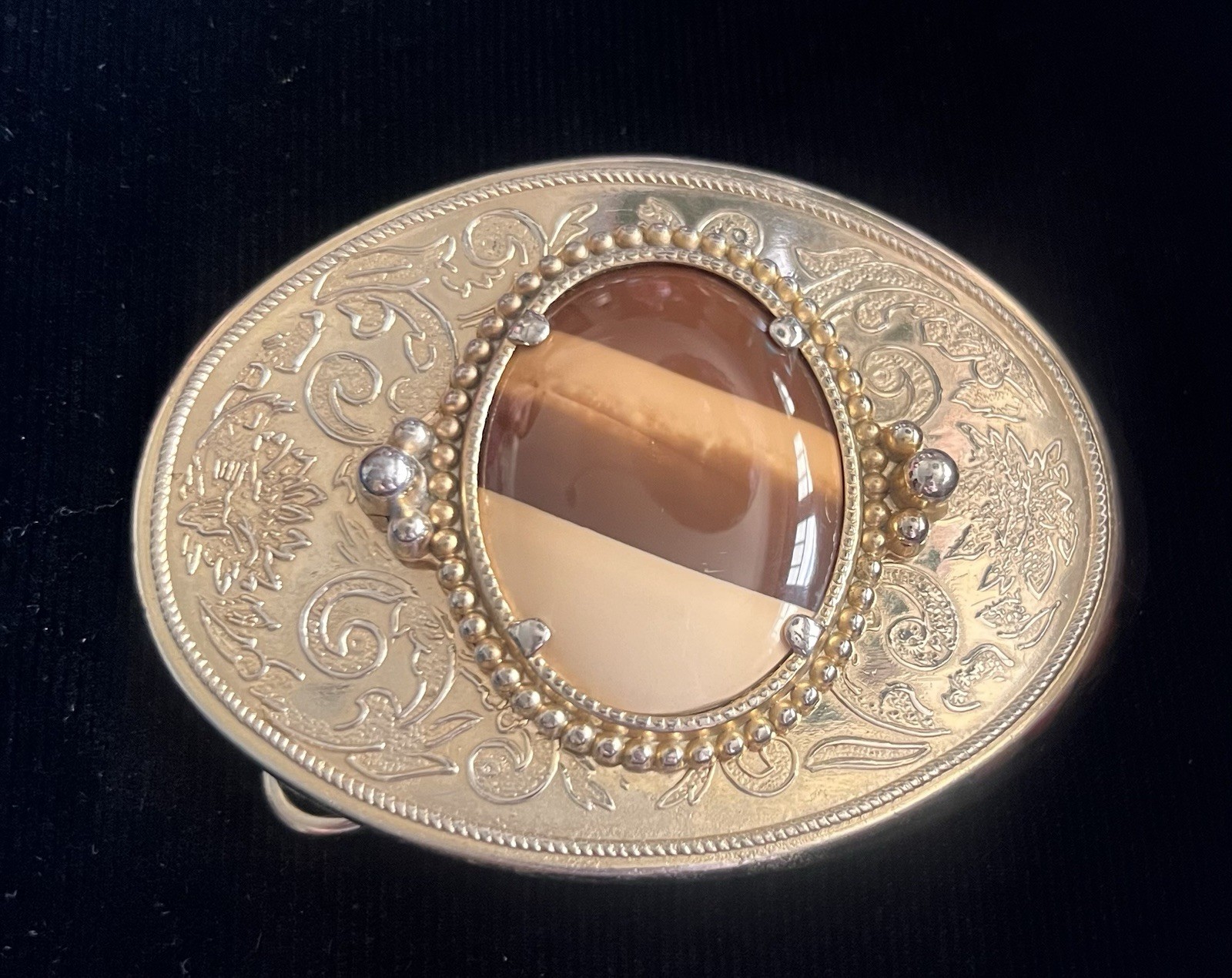 Vintage Metal gold and silver tone filigree design with cabochon belt buckle