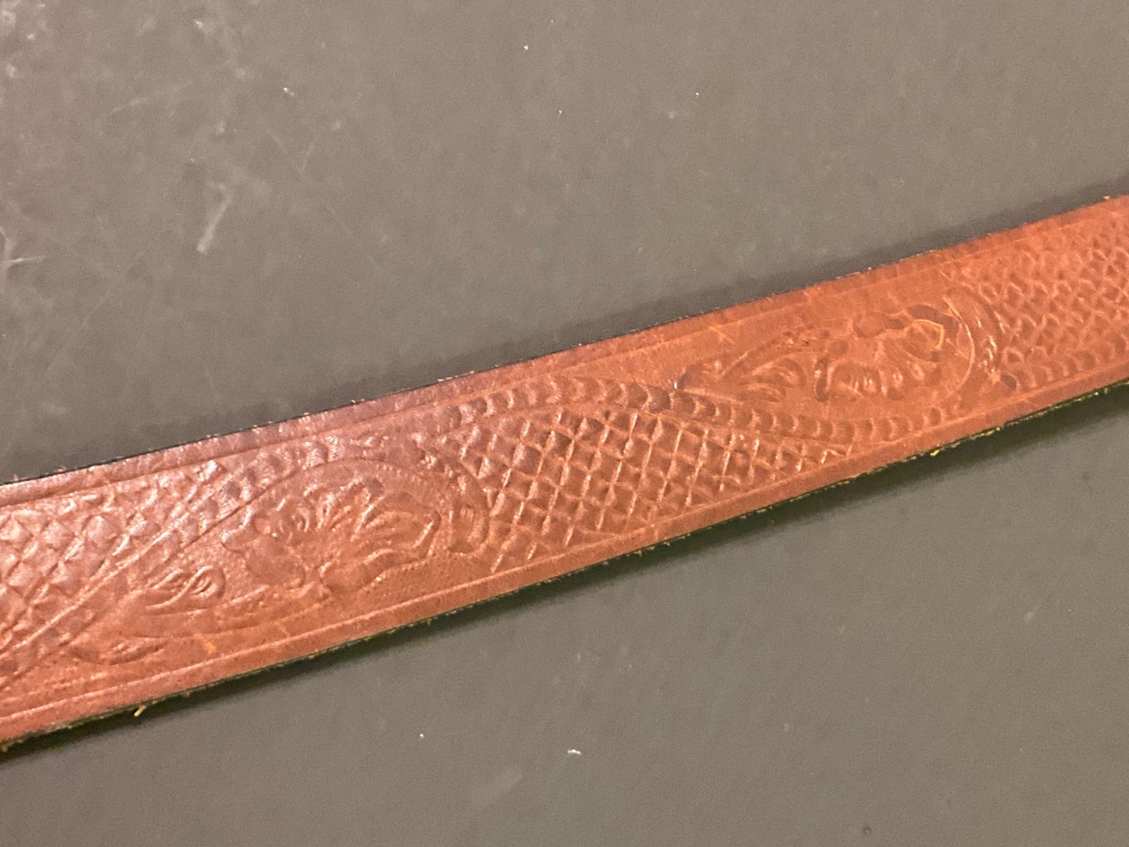 Brown hand tooled embossed Western leather Men’s belt 40″ brass buckle broken in