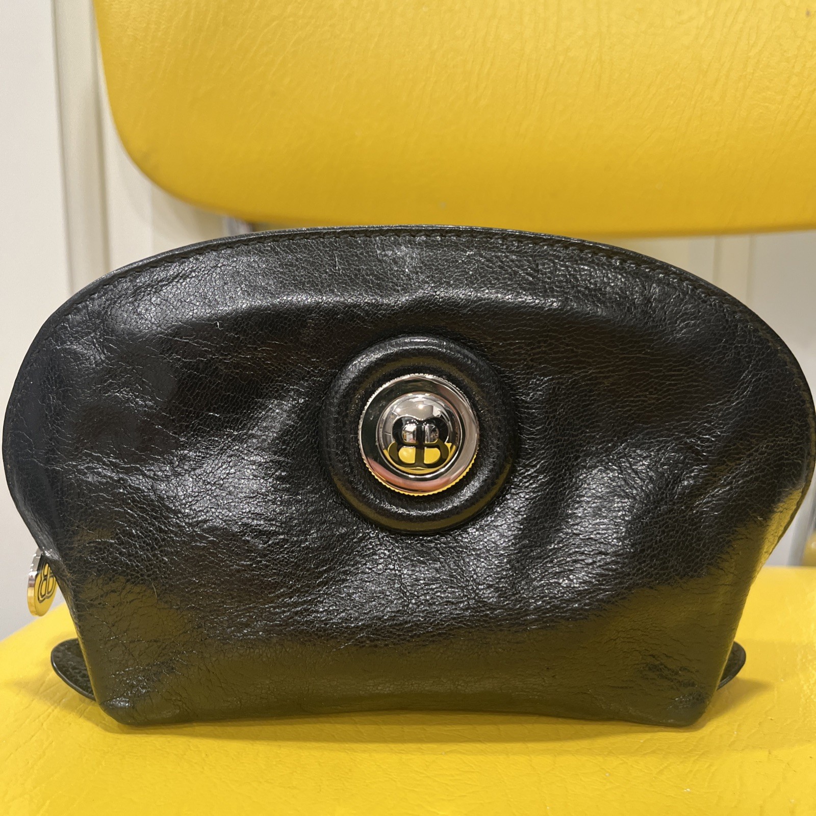 Vintage BALENCIAGA Black Leather Small zipped Bag Rare silver circular emblem.