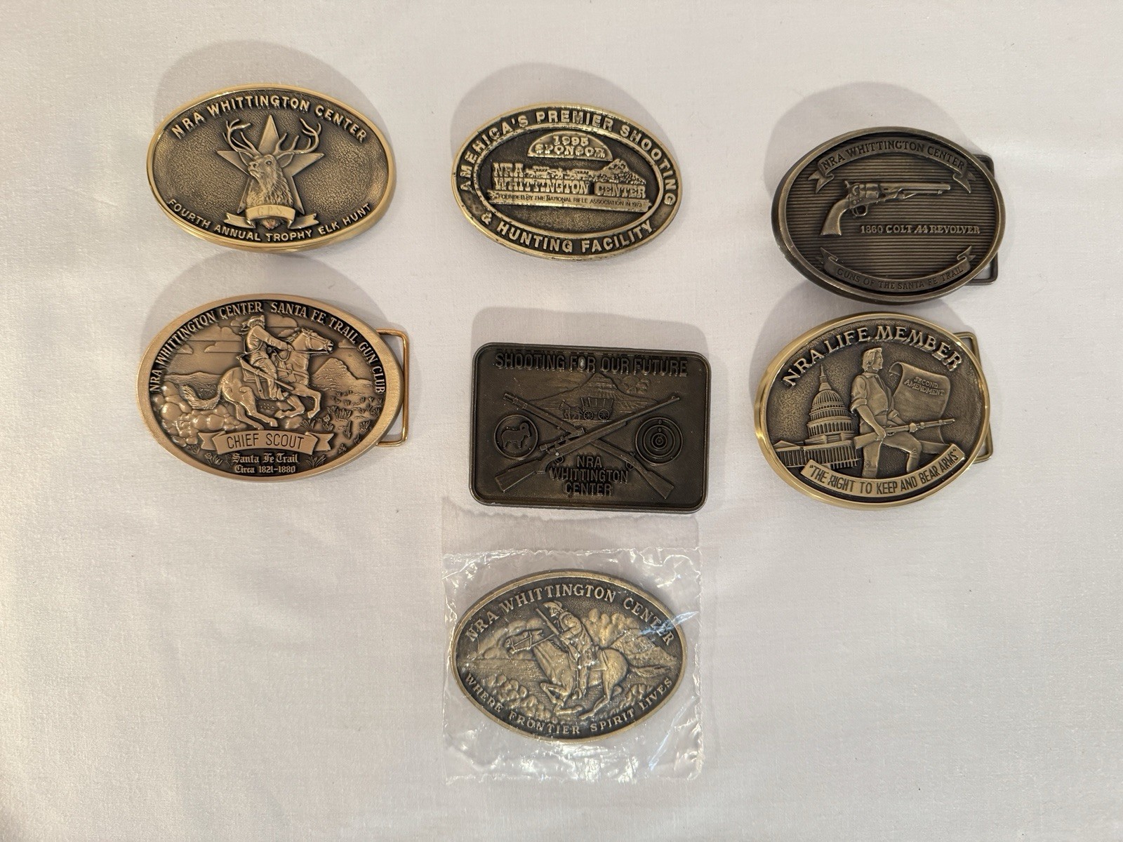 Lot Of 7 Assorted NRA Belt Buckles
