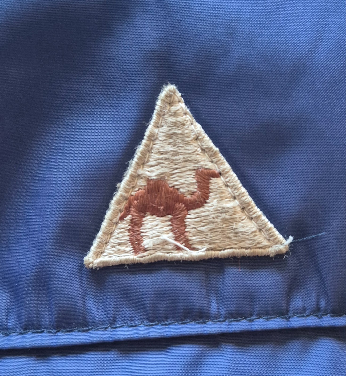Vintage 1970s-1980s reversible blue and orange puffer vest from the Camel brand