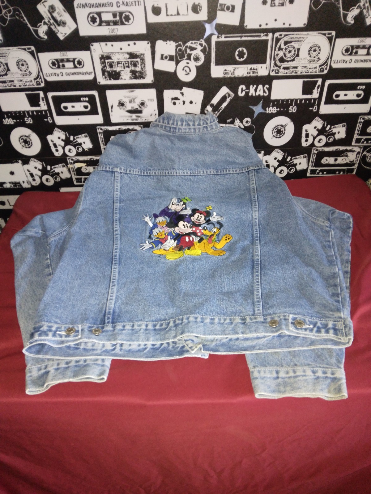 Vintage Disney jean jacket circa 1990’s w/ Disney characters patch, size large.