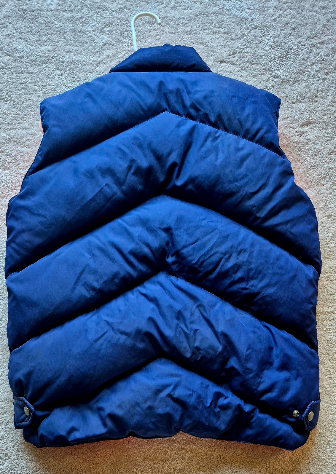 Vintage 1970s-1980s reversible blue and orange puffer vest from the Camel brand