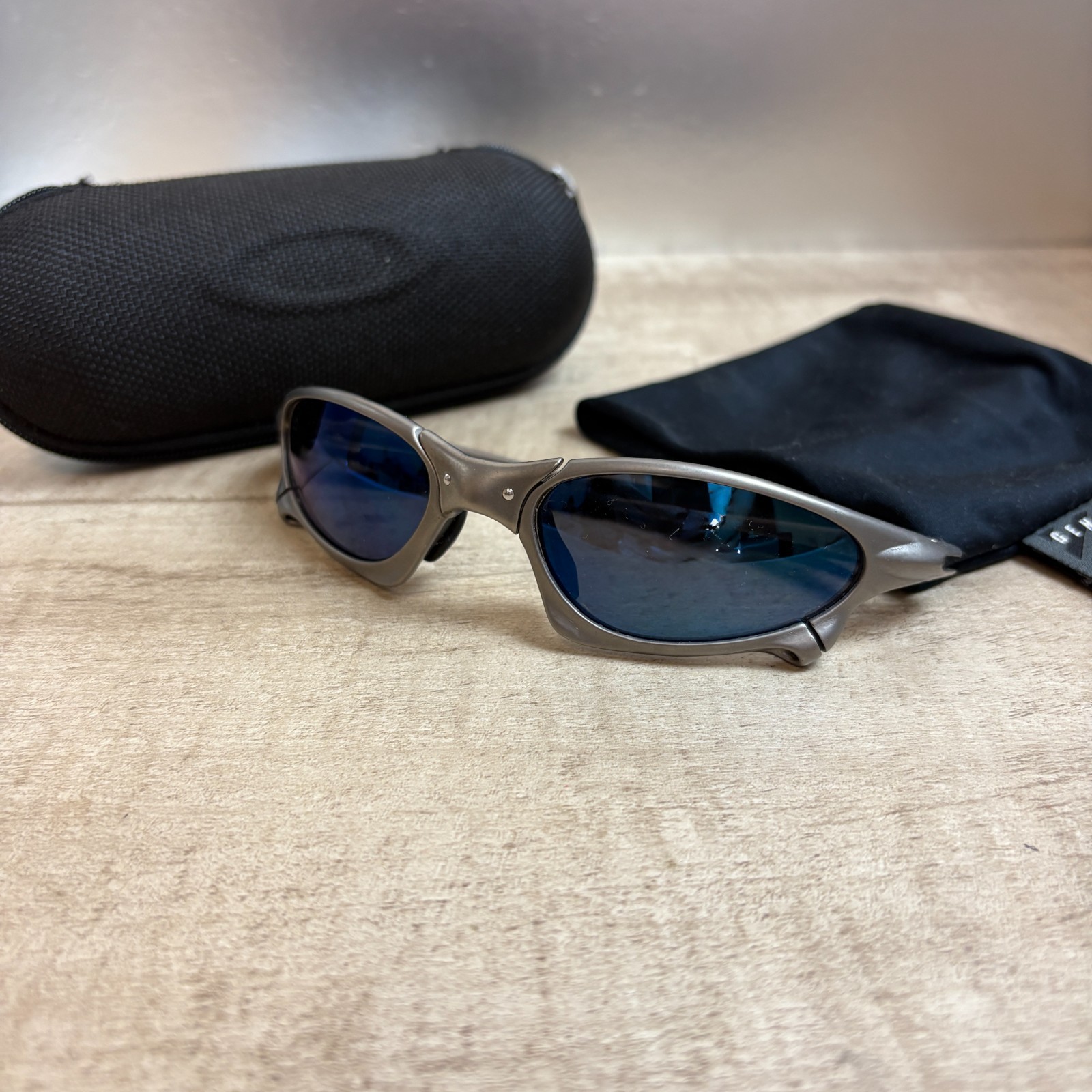 Oakley Authentic Vintage X metal Penny Titanium Ice Iridium with case Great con!