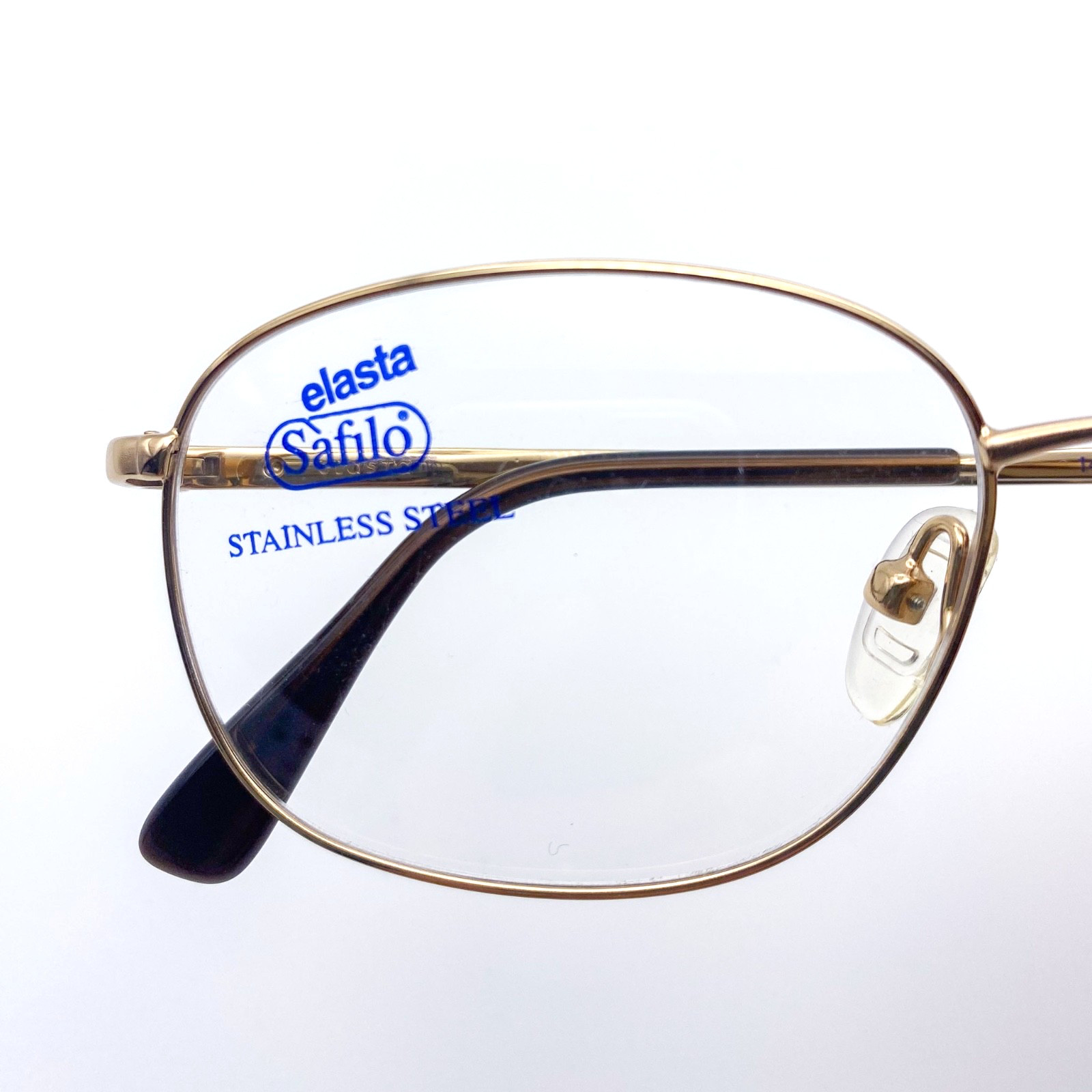 NOS 1990s Safilo Elasta Vintage Gold Stainless Steel Eyeglasses Oval Frames