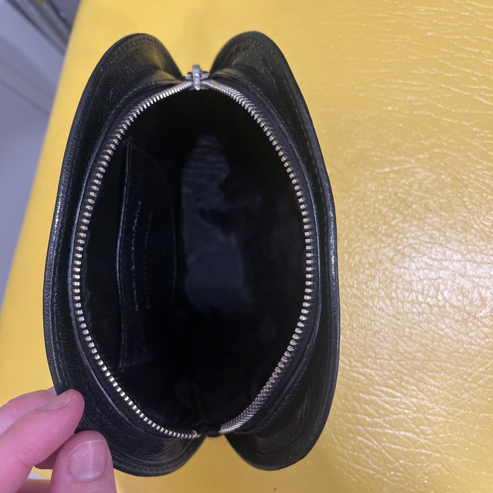 Vintage BALENCIAGA Black Leather Small zipped Bag Rare silver circular emblem.