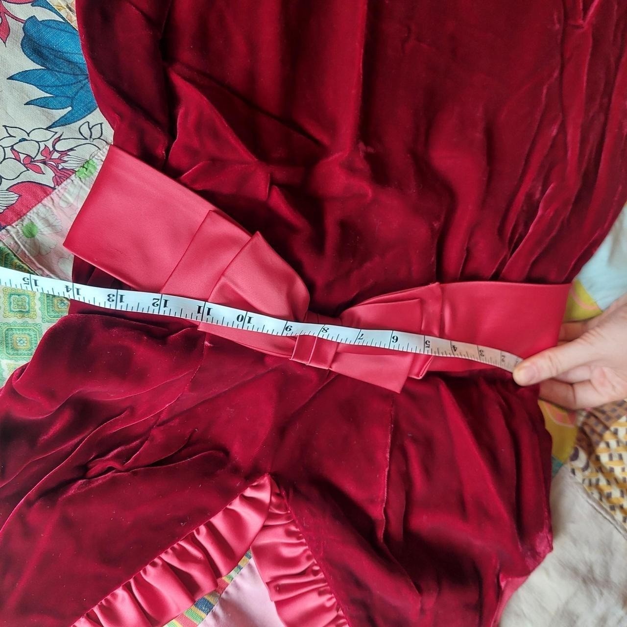 Vintage homemade red velvet dress with bow and ruffle detail.