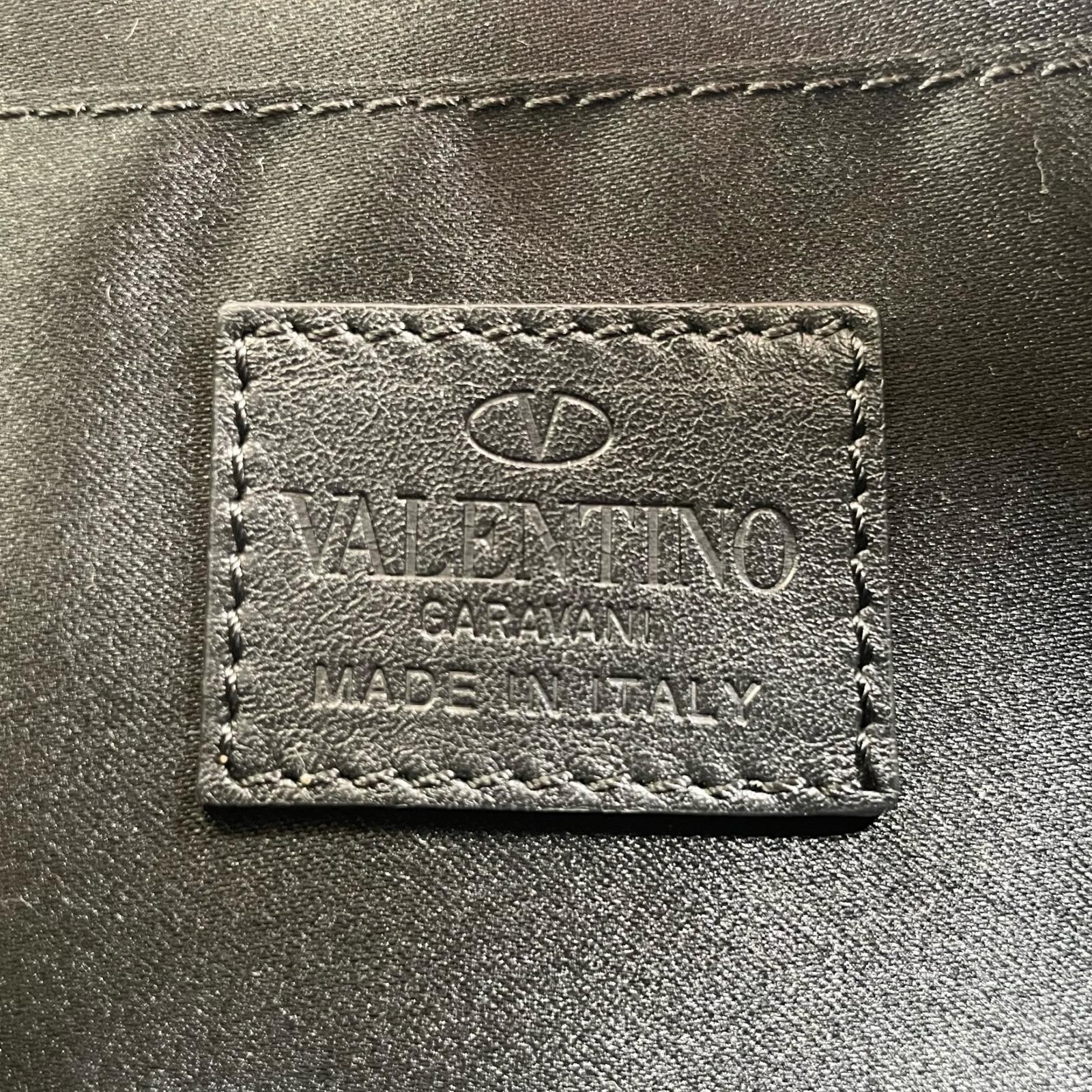Valentino Garavani Camouflage Star Leather Clutch Bag – DUTY FREE